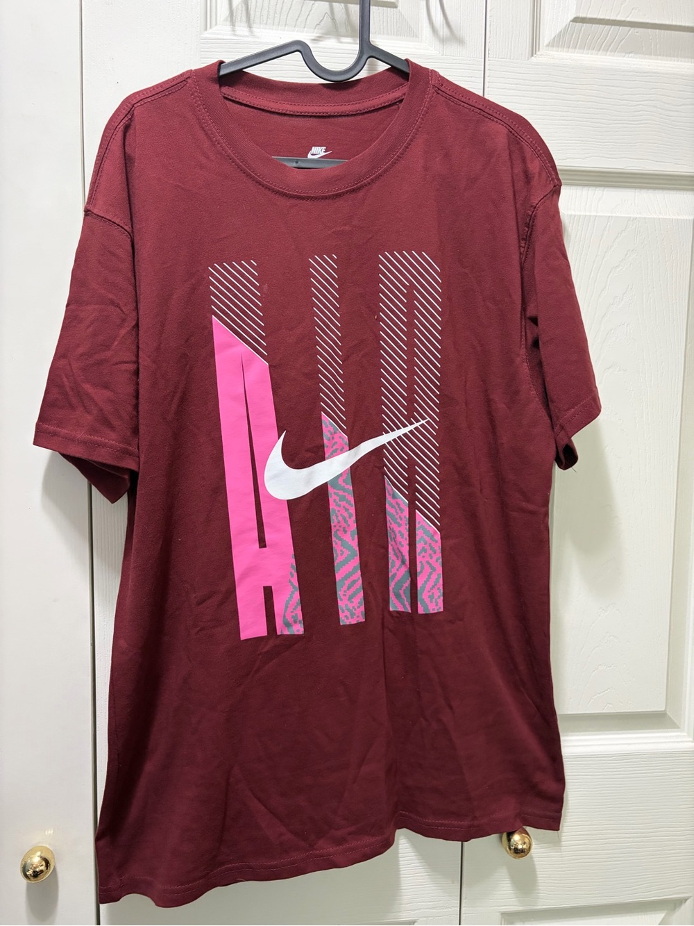 Nike Men’s Maroon Short-Sleeve Graphic Tee with Pink and White Accents